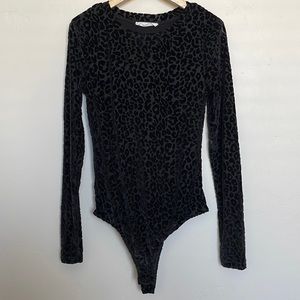 Black cheetah long sleeve bodysuit